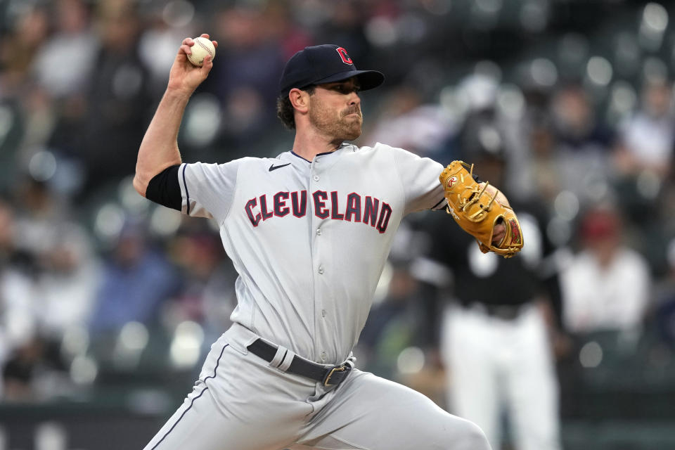 Cleveland Guardians starting pitcher Shane Bieber delivers during the first inning of the team's baseball game against the Chicago White Sox on Tuesday, May 16, 2023, in Chicago. (AP Photo/Charles Rex Arbogast)
