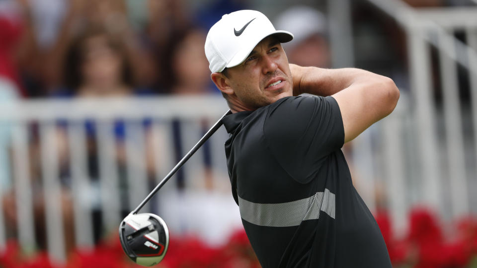 Brooks Koepka hits from the first tee during the final round of the Tour Championship golf tournament Sunday, Aug. 25, 2019, at East Lake Golf Club in Atlanta. (AP Photo/John Bazemore)