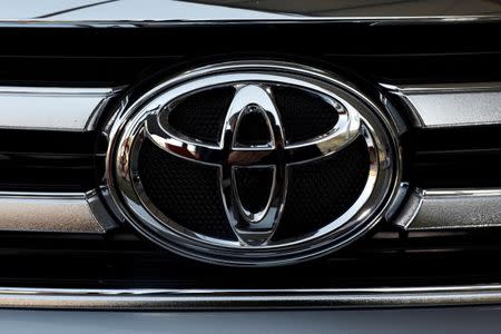 FILE PHOTO: A Toyota Motor Corp. logo is seen on a car at the International Auto Show in Mexico City, Mexico November 23, 2017. REUTERS/Henry Romero/File Photo