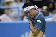 Kei Nishikori, of Japan, wipes his face during a match against Sam Querrey. of the United States, in the Citi Open tennis tournament Monday, Aug. 2, 2021, in Washington. (AP Photo/Nick Wass)