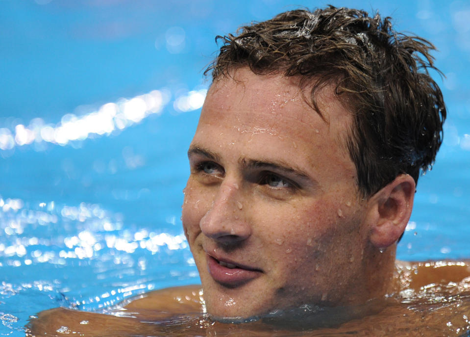 US swimmer Ryan Lochte smiles after he competed in the final of the men's 200-metre backstroke swimming event in the FINA World Championships at the indoor stadium of the Oriental Sports Center in Shanghai on July 29, 2011. Lochte won gold.      AFP PHOTO / FRANCOIS XAVIER MARIT (Photo credit should read FRANCOIS XAVIER MARIT/AFP/Getty Images)