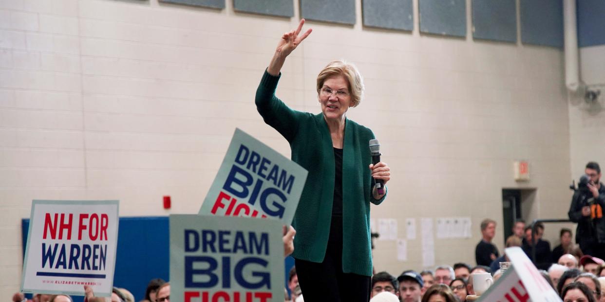 Democratic presidential candidate Sen. Elizabeth Warren, D-Mass., holds up two fingers as she speaks during a campaign stop, Saturday, Nov. 23, 2019, in Manchester, N.H. (AP Photo/Mary Schwalm)