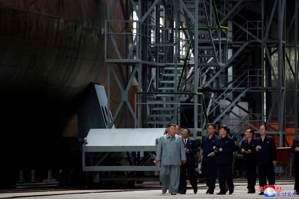 North Korean leader Kim Jong Un visits a submarine factory in an undisclosed location in this undated picture released by North Korea's state-run Central News Agency (KCNA) on Tuesday. (Photo: KCNA / Reuters)