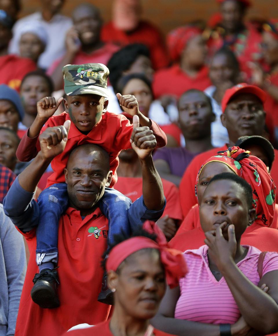 Supporters of the Economic Freedom Fighters (EFF) party, attend their election rally at Orlando Stadium in Soweto, South Africa, Sunday, May 5, 2019. Campaign rallies for South Africa’s upcoming election have reached a climax Sunday with mass rallies by the ruling party and one of its most potent challengers. (AP Photo/Themba Hadebe)