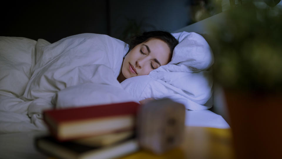 A person asleep in bed