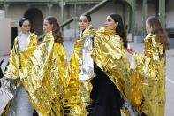 Models wait before the prsentation of Chanel Haute Couture Spring/Summer 2020 fashion collection, Tuesday Jan.21, 2020 in Paris. (AP Photo/Thibault Camus)