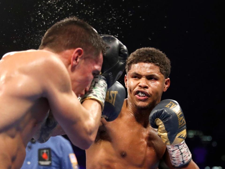 Shakur Stevenson (right) dismantled Oscar Valdez to retain his super-featherweight titles (Getty Images)