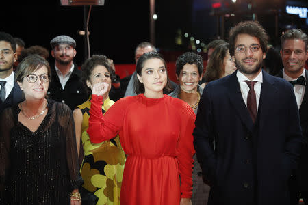 Actress Bella Camero and cast members arrive for the screening of the movie "Marighella" at the 69th Berlinale International Film Festival in Berlin, Germany, February 15, 2019. REUTERS/Hannibal Hanschke