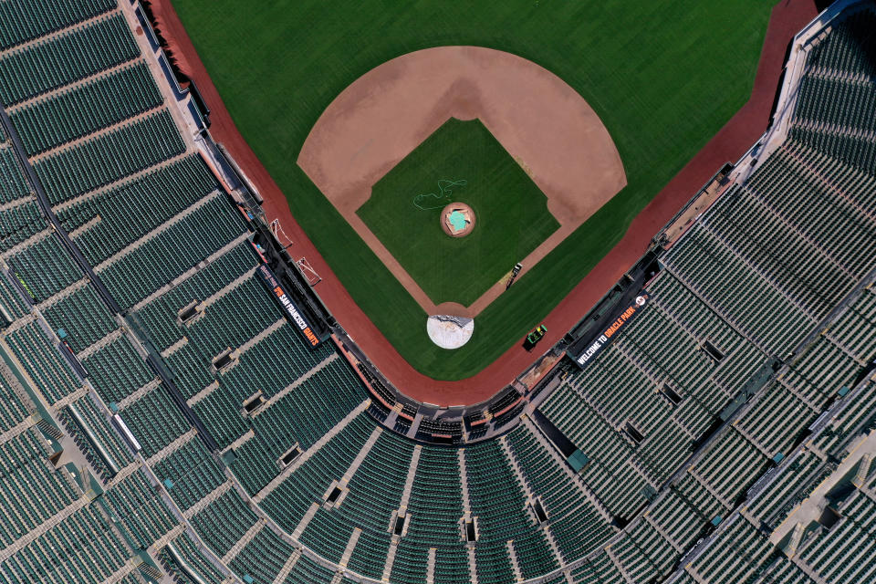 SAN FRANCISCO, CALIFORNIA  - MARCH 26:  An aerial view from a drone shows Oracle Park, home of the San Francisco Giants, empty on Opening Day March 26, 2020 in San Francisco, California. Major League Baseball Commissioner Rob Manfred recently said the league is "probably not gonna be able to" play a full 162 game regular season. (Photo by Justin Sullivan/Getty Images)