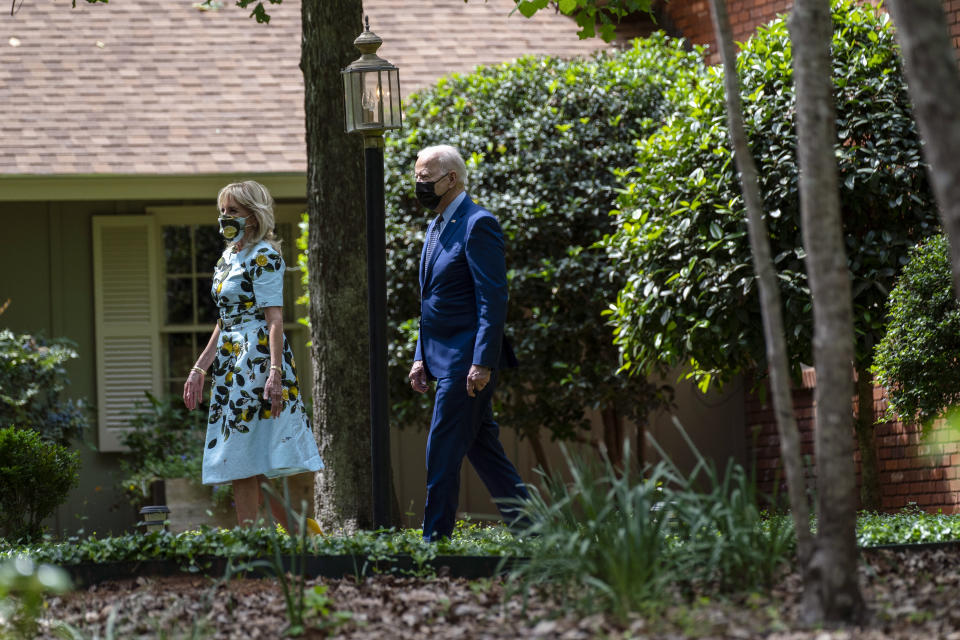 President Joe Biden and first lady Jill Biden leave the home of former President Jimmy Carter during a trip to mark Biden’s 100th day in office, Thursday, April 29, 2021, in Plains, Ga. (AP Photo/Evan Vucci)