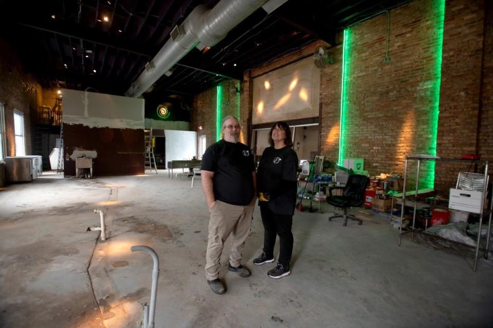 Lynn Lucas and Matt Schultheiss inside the former Spiral club in Lansing's Old Town. The couple transformed the space into Copper Moon, an event venue.