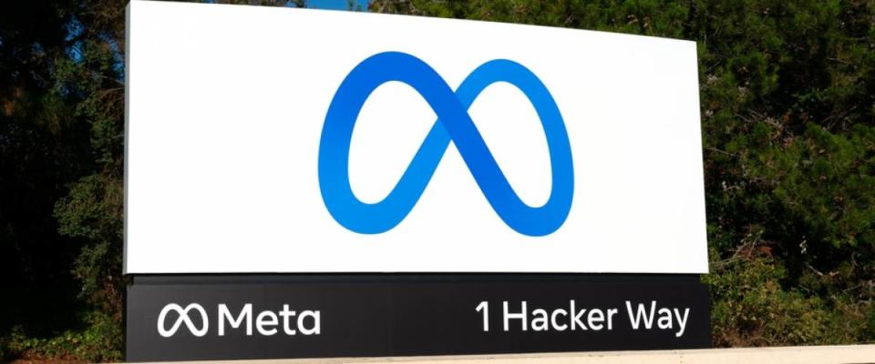 Meta sign, logo in front of Facebook headquarters on 1 Hacker Way.