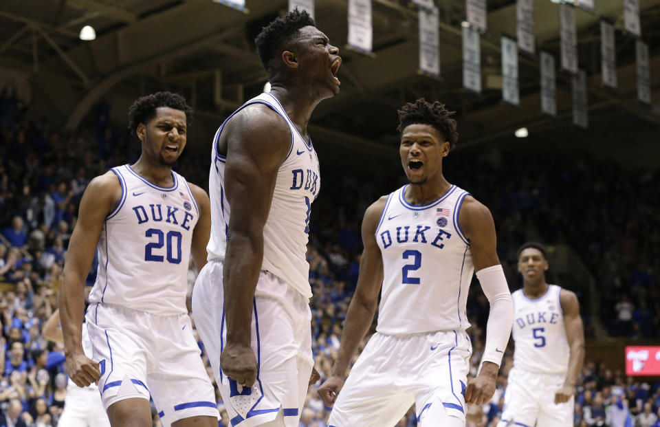 Duke’s Zion Williamson (center) reacts with Marques Bolden (20), Cam Reddish (2) and RJ Barrett (5) following a play against St. John’s on Saturday, Feb. 2, 2019. (AP)