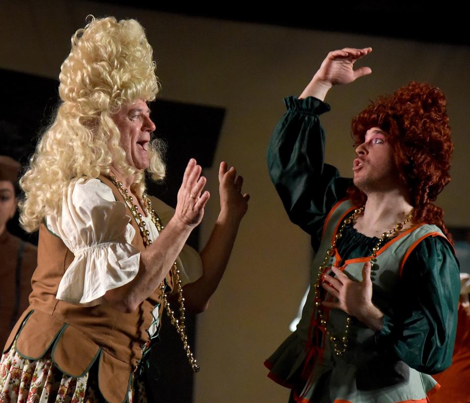 Jeff Boze of Holland, Ohio, and Josh Mohler of Monroe practice dancing as the stepsisters in the production of "Cinderella" at the River Raisin for the Arts in Monroe.