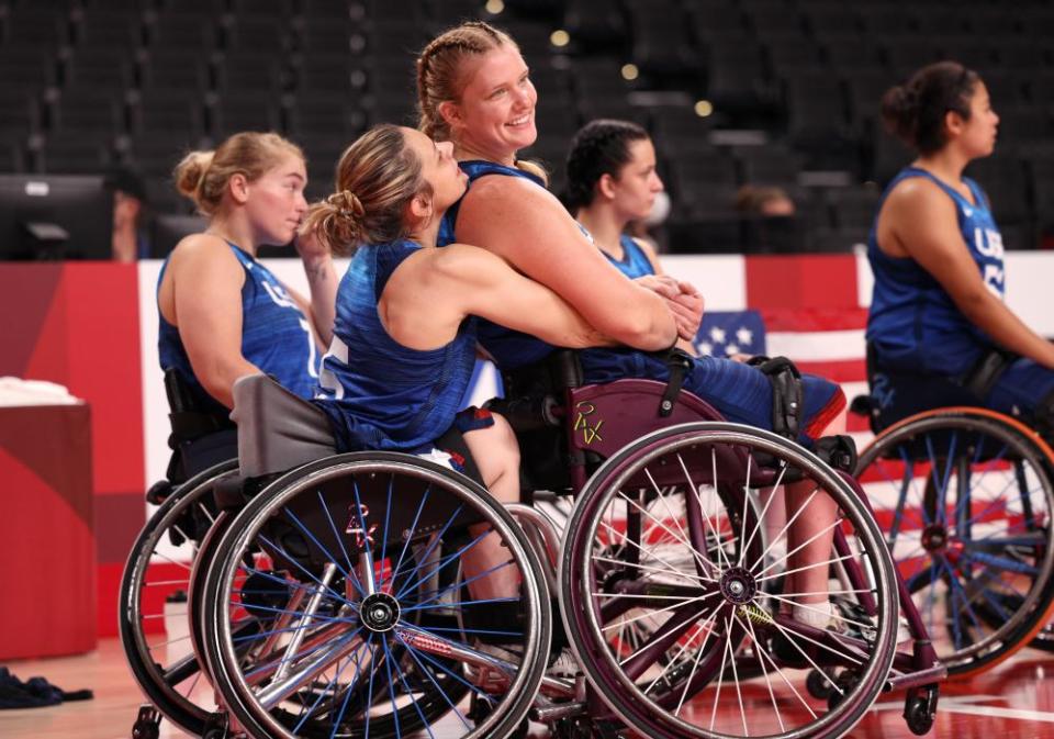 Darlene Hunter and Rose Hollermann celebrate the medal late on in the game against Germany.