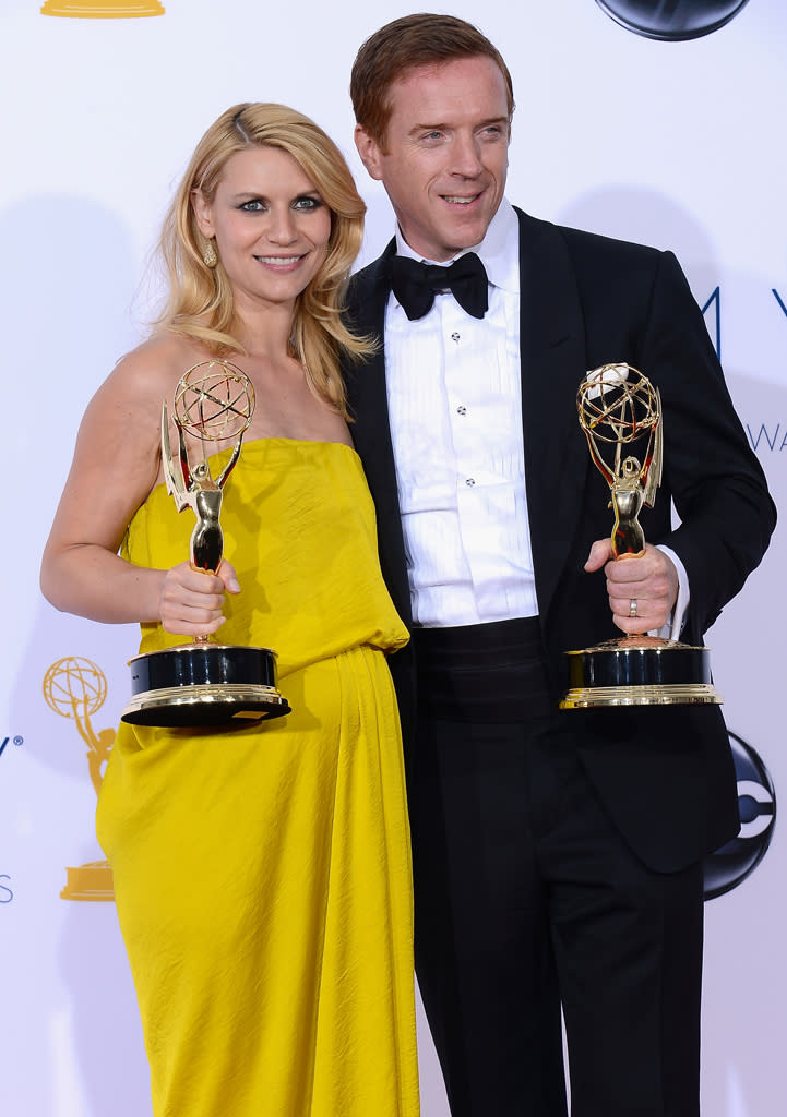 Claire Danes and Damian Lewis, winners Outstanding Drama Series for "Homeland," pose in the press room at the 64th Primetime Emmy Awards at the Nokia Theatre in Los Angeles on September 23, 2012.