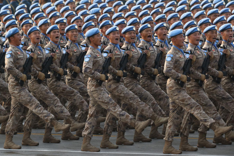 Soldiers of the People's Liberation Army march during a parade to celebrate the 70th Anniversary of the founding of the People's Republic of China in 1949, at Tiananmen Square on October 1, 2019 in Beijing, China.<span class="copyright">Photo by Andrea Verdelli/Getty Images</span>