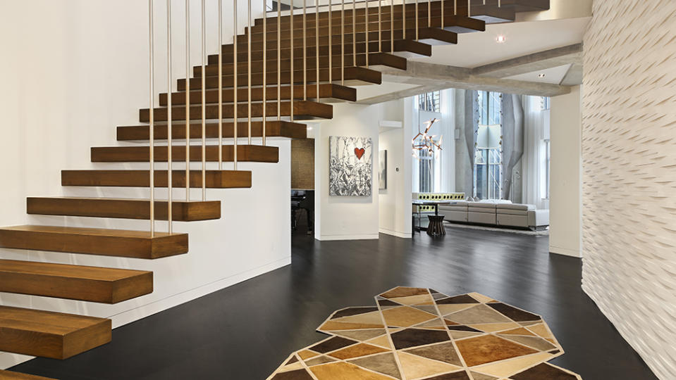 The white-oak staircase that leads the home’s roof. - Credit: Forbes Global Properties