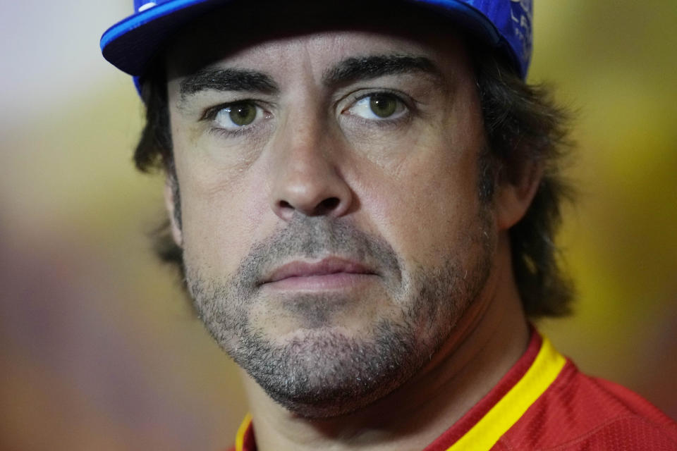 Alpine driver Fernando Alonso of Spain addresses to the media during a press conference at the Barcelona Catalunya racetrack in Montmelo, Spain, Friday, May 20, 2022. The Formula One race will be held on Sunday. (AP Photo/Manu Fernandez)