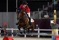 United States' Jessica Springsteen, riding Don Juan van de Donkhoeve, competes during the equestrian jumping individual qualifying at Equestrian Park in Tokyo at the 2020 Summer Olympics, Tuesday, Aug. 3, 2021, in Tokyo, Japan. (AP Photo/Carolyn Kaster)