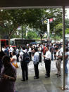 Commuters queuing for bridging buses outside Dhoby Ghaut station. Most said they waited between five and 10 minutes, with some experiencing a waiting time of about 15 minutes. (Yahoo! photo/Lin Wenjian)