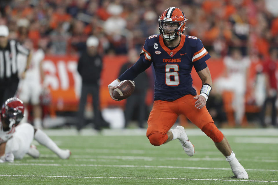 Syracuse quarterback Garrett Shrader (6) rushes during the first half of an NCAA college football game against North Carolina State, Saturday, Oct. 15, 2022, in Syracuse, N.Y. (AP Photo/Joshua Bessex)