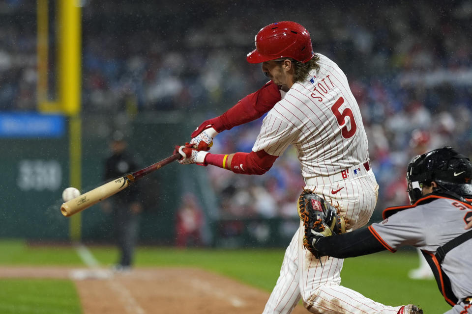 Philadelphia Phillies' Bryson Stott hits a run-scoring single against San Francisco Giants pitcher Mitch White during the second inning of a baseball game, Saturday, May 4, 2024, in Philadelphia. (AP Photo/Matt Slocum)