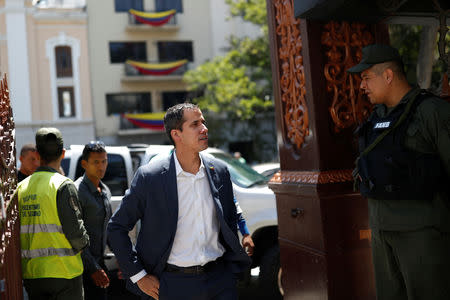 Venezuelan opposition leader Juan Guaido, who many nations have recognized as the country's rightful interim ruler, arrives to attend a news conference in Caracas, Venezuela March 10, 2019. REUTERS/Carlos Garcia Rawlins