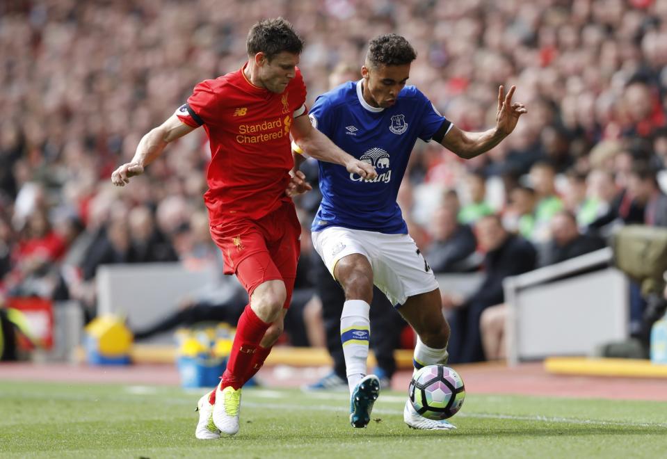 <p>Everton’s Dominic Calvert-Lewin in action with Liverpool’s James Milner </p>