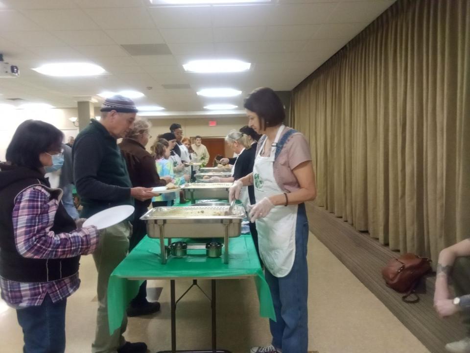 Serving line for "Faithful Feast Supper" at St. James.