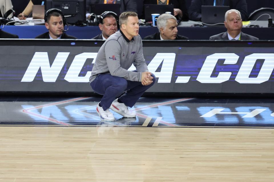 Dusty May looks on from the sidelines during the tense second half of FAU's Final Four game against San Diego State.