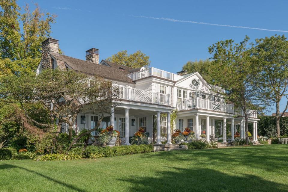 <p>“For this Dutch Colonial home, we chose to do a custom cream color by Sherwin-Williams. We used it for the entire exterior, including the trim, windows, shutters, and wall shingles. It presents a simple, quiet, and timeless composition. The shadows from the sunlight are what create the soft undertones, shifting and varying throughout the day to reveal the textures of the house.” —Eric J. Smith of <a href="https://www.ericjsmitharchitect.com/" rel="nofollow noopener" target="_blank" data-ylk="slk:Eric J. Smith Architect;elm:context_link;itc:0;sec:content-canvas" class="link ">Eric J. Smith Architect</a></p>