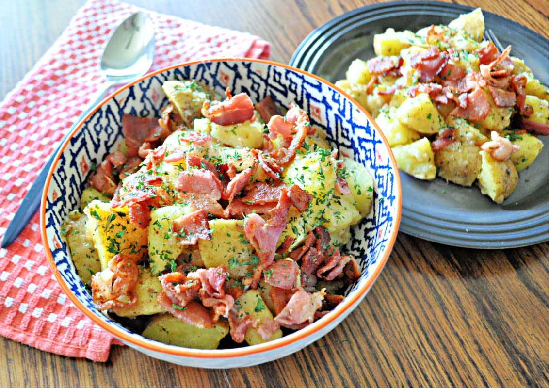 <p>German potato salad is one of those dishes that even those who haven't tried it know a couple of things about. It contains <a href="https://parade.com/1105169/parade/bacon-recipes/" rel="nofollow noopener" target="_blank" data-ylk="slk:bacon;elm:context_link;itc:0;sec:content-canvas" class="link rapid-noclick-resp">bacon</a> and is served warm, but if you've ever tasted it, you know the flavor profile is unlike most other tater salads out there. <a href="https://parade.com/1227223/kristamarshall/german-potato-salad/" rel="nofollow noopener" target="_blank" data-ylk="slk:See the recipe;elm:context_link;itc:0;sec:content-canvas" class="link rapid-noclick-resp">See the recipe</a>. </p><p><strong>Related: <a href="https://parade.com/428487/alison-abbey/8-ways-to-celebrate-oktoberfest/" rel="nofollow noopener" target="_blank" data-ylk="slk:8 Ways to Celebrate Oktoberfest;elm:context_link;itc:0;sec:content-canvas" class="link rapid-noclick-resp">8 Ways to Celebrate Oktoberfest</a></strong></p>