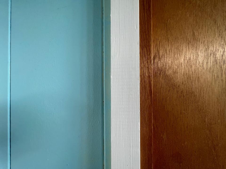 blue wall next to door