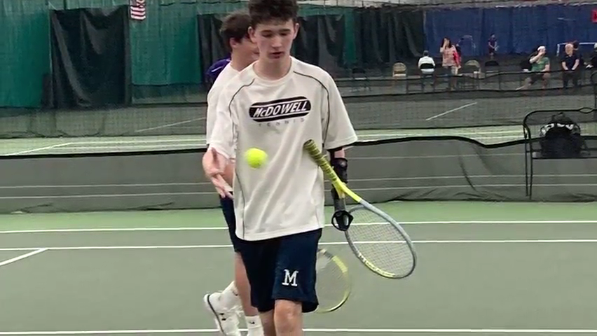 McDowell freshman Christian Neubert started for its boys tennis team during the postseason despite being born without a left hand.
