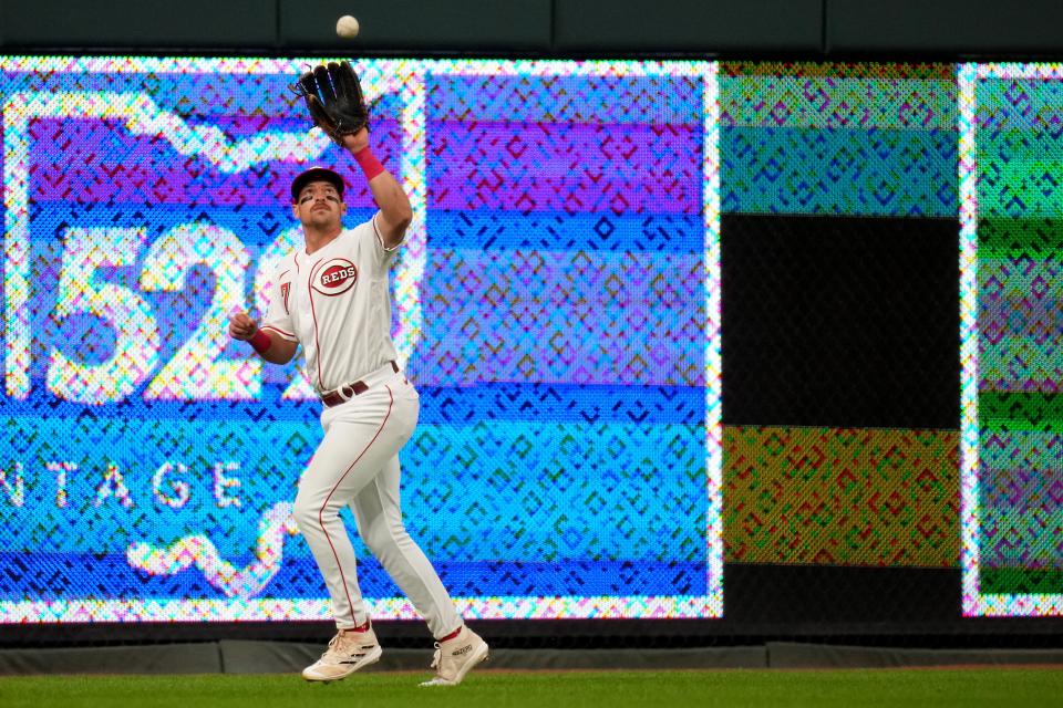 Cincinnati Reds first baseman Spencer Steer (7) catches a fly ball in the eighth inning of a baseball game against the Minnesota Twins, Monday, Sept. 18, 2023, at Great American Ball Park in Cincinnati.