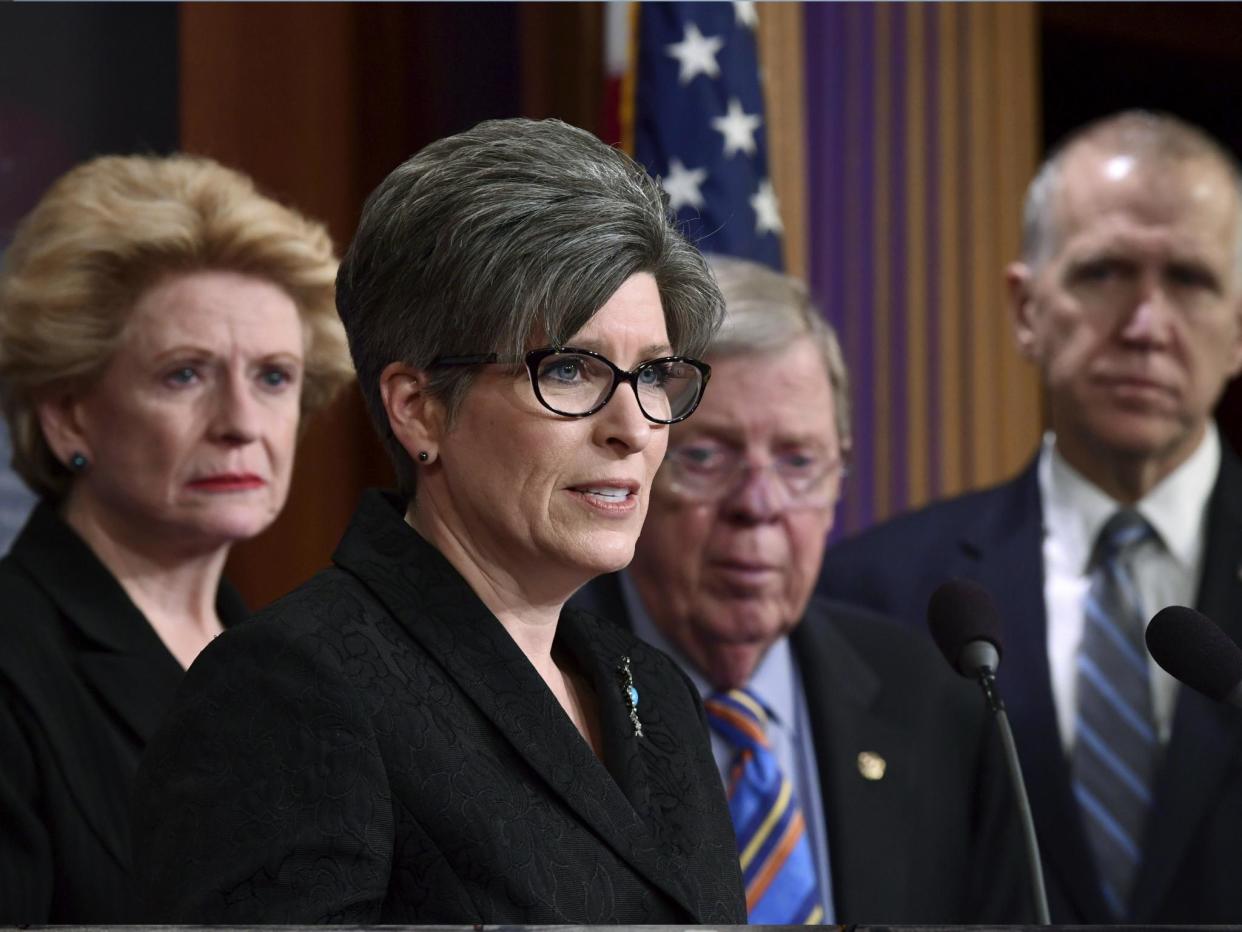 Senator Joni Ernst spoke in Washington 7 February 2018 to announce a bipartisan resolution to have a special committee investigate the US Olympic Committee and USA Gymnastics: AP Photo/Susan Walsh