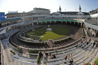 Visitors check out the new $200 million paddock at Churchill Downs Wednesday, May 1, 2024, in Louisville, Ky. The 150th running of the Kentucky Derby is scheduled for Saturday, May 4. (AP Photo/Charlie Riedel)