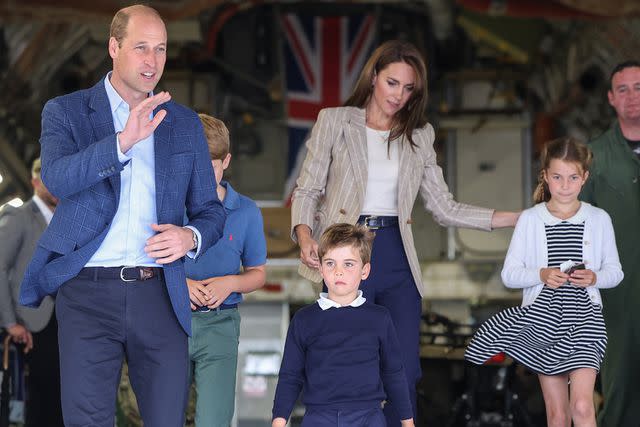 <p>Chris Jackson/Getty Images</p> Prince William and Kate Middleton and their family in July 2023