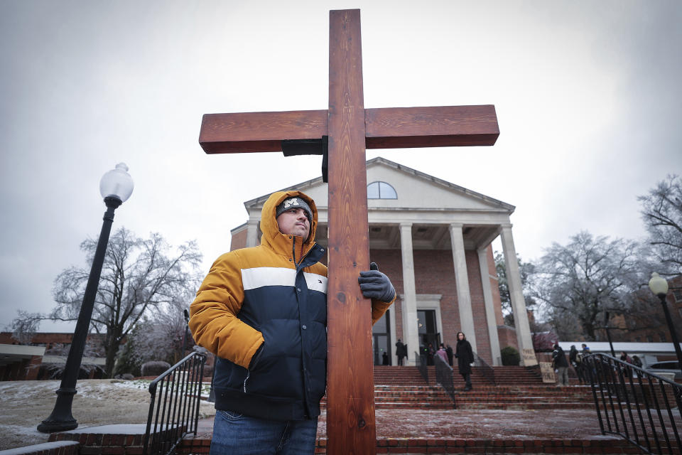 Tristan Strickland, who drove from Michigan, pays his respects outside Mississippi Boulevard Christian Church before the funeral service for Tyre Nichols in Memphis, Tenn., on Wednesday, Feb. 1, 2023. Nichols died following a brutal beating by Memphis police after a traffic stop. (Patrick Lantrip/Daily Memphian via AP)