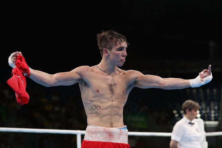 Michael John Conlan of Ireland jestures to the crowd after his defeat to Vladimir Nikitin on Tuesday. (AP)