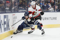 Columbus Blue Jackets' Jakub Voracek, left, and Ottawa Senators' Thomas Chabot chase the puck during the second period of an NHL hockey game Sunday, Jan. 23, 2022, in Columbus, Ohio. (AP Photo/Jay LaPrete)