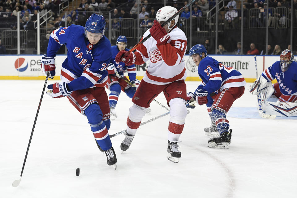 New York Rangers right wing Kaapo Kakko (24) and Detroit Red Wings center Valtteri Filppula (51) vie for the puck during the third period of an NHL hockey game, Friday, Jan. 31, 2020, in New York. (AP Photo/Sarah Stier)