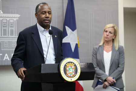 Housing and Urban Development Secretary Ben Carson (L) addresses the media near Homeland Security Secretary Kirstjen Nielsen, after Hurricane Maria's devastation, in San Juan, Puerto Rico, December 19, 2017. REUTERS/Alvin Baez