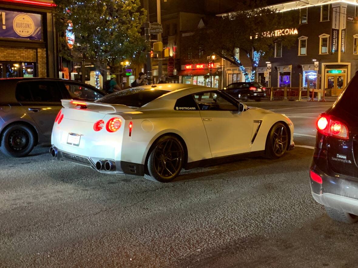 Gateway Boulevard and Whyte Avenue in south Edmonton are common areas for excessive vehicle noise and racing.  (Natasha Riebe/CBC - image credit)