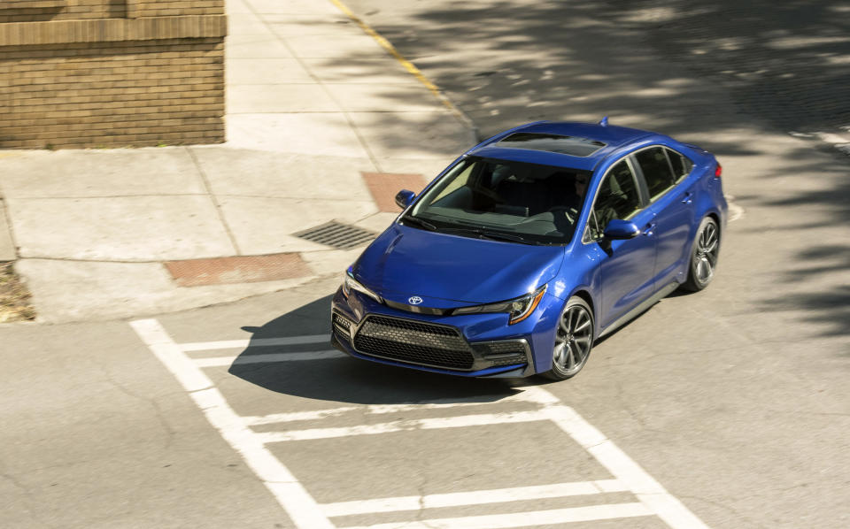 This photo from Toyota shows the Corolla sedan. It's not as enjoyable to drive as the Civic but is otherwise strong on value. (Toyota via AP)