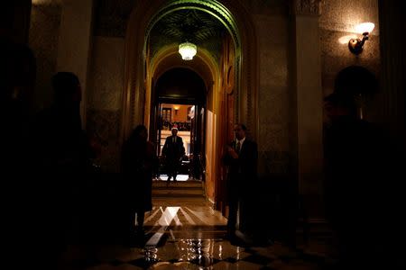 A lawmaker leaves the Senate Chamber at the U.S. Capitol in Washington, January 20, 2016. REUTERS/Carlos Barria