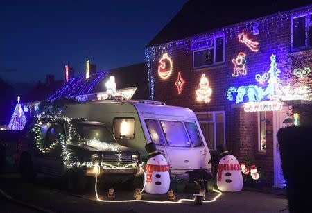 A home is decorated with a display of Christmas of lights in a tradition that has grown over recent years in the small village of Westfield in Sussex, south east England, December 15, 2016. Picture taken on December 15. REUTERS/Toby Melville