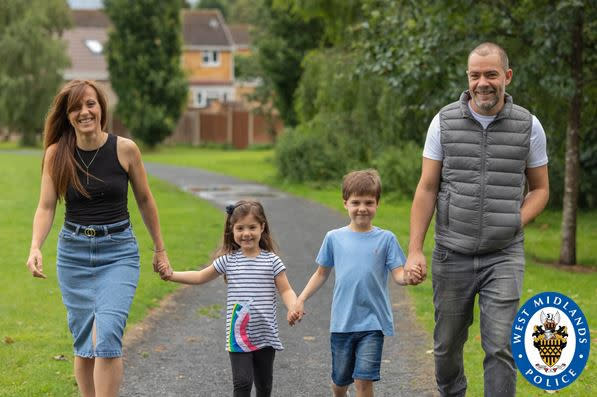 Undated handout photo issued by West Midlands Police of William Till, a police community support officer, reunited with his family after he left home for three months during lockdown because his son was shielding.