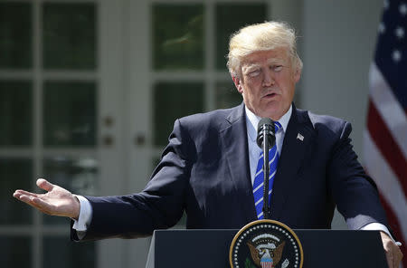 U.S. President Donald Trump speaks as he holds a joint news conference with Spanish Prime Minister Mariano Rajoy in the Rose Garden at the White House in Washington, U.S., September 26, 2017. REUTERS/Joshua Roberts